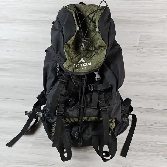 Teton Scout 3400, an earlier version of the Scout 55L, standing on a wooden floor